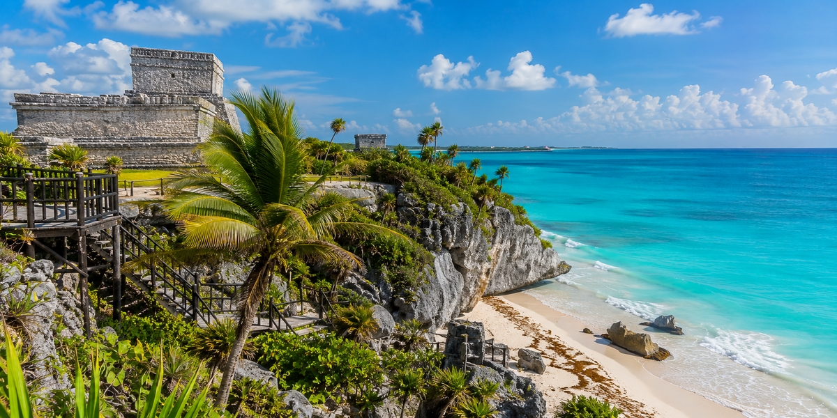 Punta Cancun peninsula resort with sheltered corner beach used to compare Grand Fiesta Americana Coral Beach