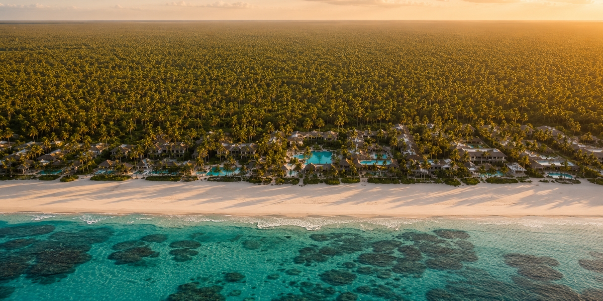Wide white-sand Bavaro beach with calm reef-protected water, the classic Punta Cana setting